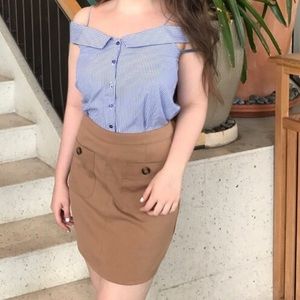 Tan button mini skirt